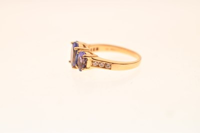 Lot 24 - Tanzanite and diamond 18ct gold ring