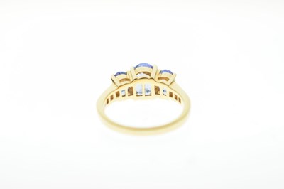 Lot 24 - Tanzanite and diamond 18ct gold ring