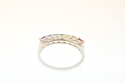 Lot 71 - Fancy coloured sapphire seven-stone 9ct white gold ring