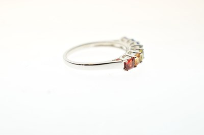 Lot 71 - Fancy coloured sapphire seven-stone 9ct white gold ring