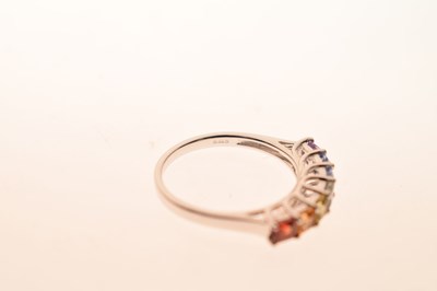 Lot 71 - Fancy coloured sapphire seven-stone 9ct white gold ring