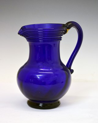 Lot 239 - Early-mid 19th century cobalt blue glass jug