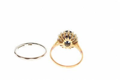 Lot 78 - Sapphire and diamond cluster 18ct gold ring