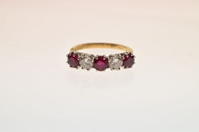 Lot 46 - Ruby and diamond five-stone 18ct yellow gold ring