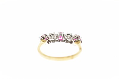 Lot 46 - Ruby and diamond five-stone 18ct yellow gold ring