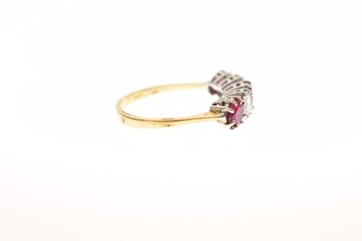 Lot 46 - Ruby and diamond five-stone 18ct yellow gold ring