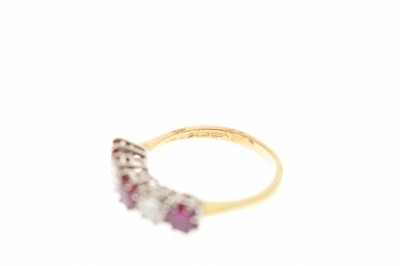Lot 46 - Ruby and diamond five-stone 18ct yellow gold ring
