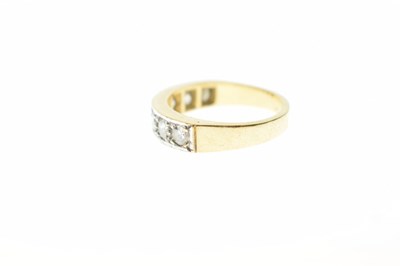 Lot 10 - Diamond seven-stone 18ct gold half eternity ring