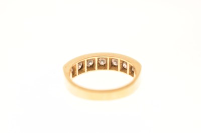 Lot 10 - Diamond seven-stone 18ct gold half eternity ring