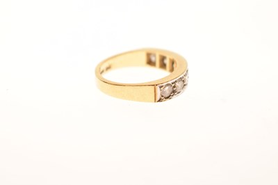 Lot 10 - Diamond seven-stone 18ct gold half eternity ring