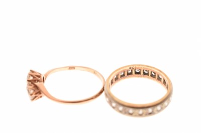 Lot 92 - 9ct gold two-stone crossover ring