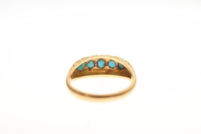 Lot 19 - Edwardian turquoise five stone 18ct yellow gold ring