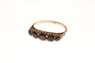 Lot 94 - Two red stone set rings and a pair of earrings