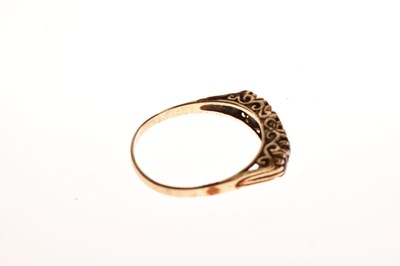 Lot 94 - Two red stone set rings and a pair of earrings