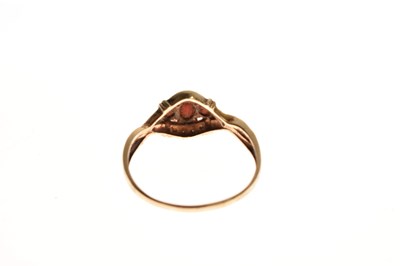 Lot 94 - Two red stone set rings and a pair of earrings