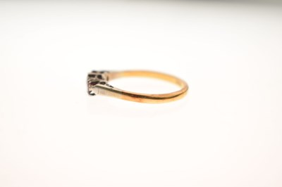 Lot 44 - Illusion set diamond and ruby three-stone ring, stamped '18ct'
