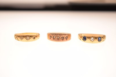 Lot 90 - Edwardian 18ct gold sapphire and diamond gypsy set three-stone ring