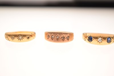 Lot 90 - Edwardian 18ct gold sapphire and diamond gypsy set three-stone ring