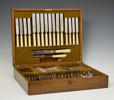 Lot 219 - Early 20th century Mappin & Webb oak canteen of silver plated cutlery