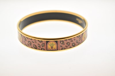 Lot 68 - Hermès, Paris - Enamel bangle or bracelet, with leopard print design