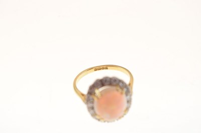Lot 28 - Opal and diamond 18ct gold cluster ring