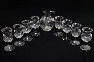 Lot 287 - Harry Powell for James Powell & Sons set of eight wine glasses, and water jug