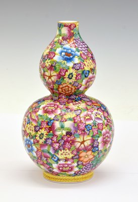 Lot 320 - Chinese Canton Famille Rose porcelain 'Thousand Flowers' pattern double gourd vase