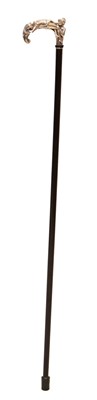 Lot 135 - Ebony walking cane, of recent manufacture, with an 'Arabian Nights' silver handle