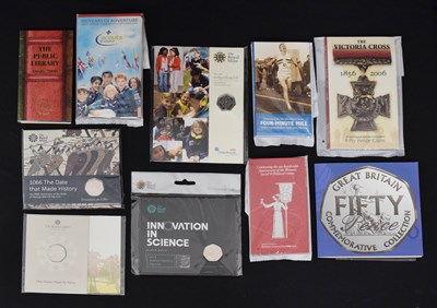 Lot 162 - Ten Royal Mint presentation 50p coin packs