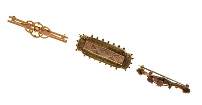 Lot 65 - Three 9ct gold brooches