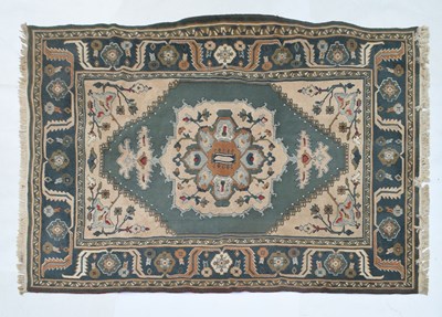 Lot 402 - Machine-made Eastern-style wool rug