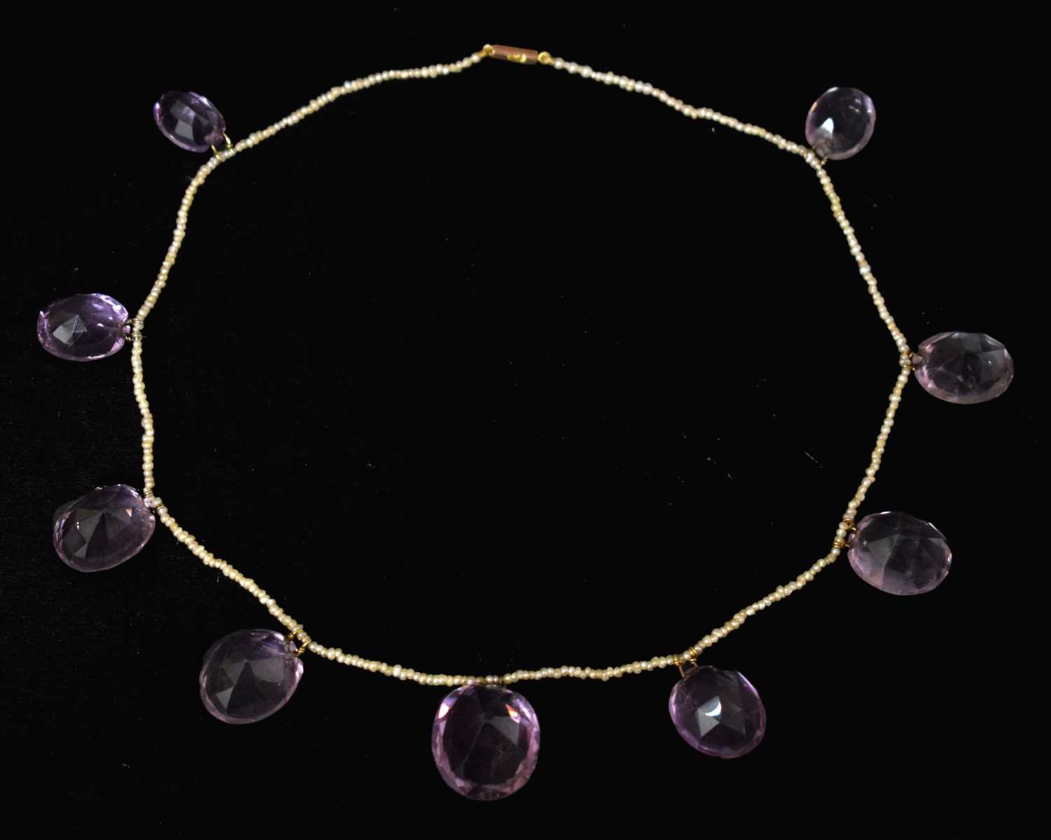 Lot 45 - Late Victorian amethyst and seed pearl 9ct rose gold necklace