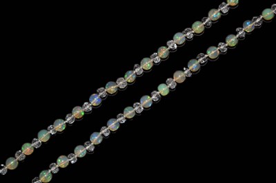 Lot 46 - Yellow metal, opal and rock crystal bead necklace