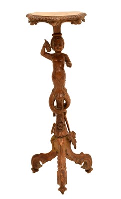 Lot 497 - 19th century Italian carved fruitwood figural torchere