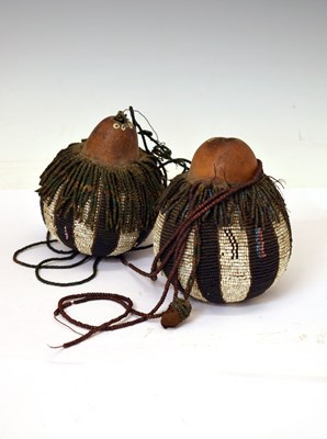 Lot 258 - Pair of beadwork-covered gourds