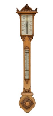 Lot 416 - Late Victorian carved oak stick barometer by J. H. Steward, London