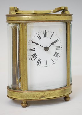 Lot 421 - Early 20th century French oval brass cased carriage timepiece