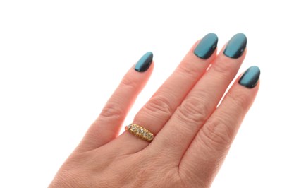 Lot 9 - Diamond 18ct yellow gold ring