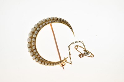 Lot 29 - Victorian 15ct gold pearl crescent brooch