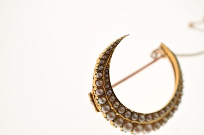 Lot 29 - Victorian 15ct gold pearl crescent brooch
