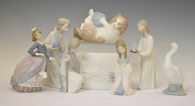 Lot 294 - Lladro - Six porcelain figures, and two Nao figures