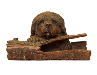 Lot 259 - Late 19th century Black Forest carved linden wood inkstand