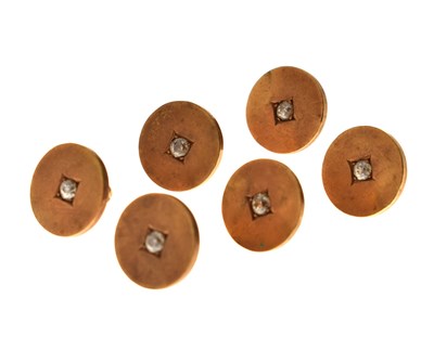 Lot 61 - Set of six diamond set shirt studs