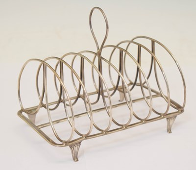 Lot 421 - George III silver toast rack of rectangular form