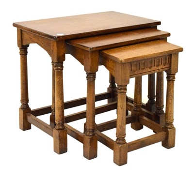 Lot 691 - Nest of oak tables