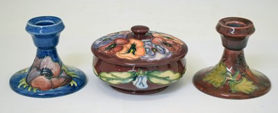 Lot 629 - Moorcroft - Pansy powder bowl and candlesticks