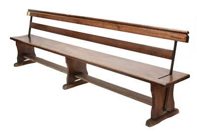 Lot 461 - Early 20th century cast iron and oak tram style Sunday School bench