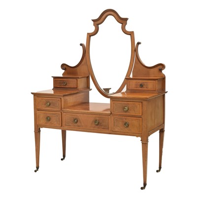Lot 770 - Edwardian inlaid mahogany dressing table with bevelled shield-shaped mirror