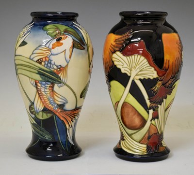 Lot 617 - Moorcroft - 'Quiet Waters' baluster vase and another 'Parasols' pattern (2)