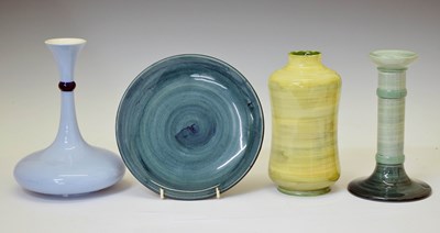 Lot 636 - Moorcroft - Colour trial candlestick, waisted vase, plate and tapered neck vase
